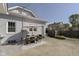 Charming backyard featuring a patio set for outdoor dining on a concrete pad at 825 Iowa St, Indianapolis, IN 46203