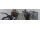 An unfinished basement area provides ample storage space with gray carpeting throughout at 825 Iowa St, Indianapolis, IN 46203
