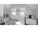 Calm Bedroom featuring two cribs, natural light, and soothing decor at 825 Iowa St, Indianapolis, IN 46203