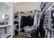 Organized walk-in closet featuring ample storage space for clothing, shoes, and accessories at 825 Iowa St, Indianapolis, IN 46203