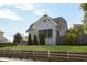 Charming two-story home with classic architectural details and a well-manicured front yard at 825 Iowa St, Indianapolis, IN 46203