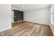 Empty bedroom featuring new vinyl floors, a large closet, and ample natural lighting at 877 Rosalind Pl, Carmel, IN 46032