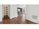 Welcoming entryway with hardwood floors and easy access to other areas of the home at 877 Rosalind Pl, Carmel, IN 46032