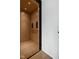 Wood paneled elevator with mounted handrail providing easy access to upper floors at 904 Veterans Way, Carmel, IN 46032