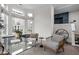 Cozy office space with custom built in seating, neutral decor, and large windows allowing for natural light at 904 Veterans Way, Carmel, IN 46032