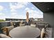 Rooftop deck with dining, seating, and relaxing space for entertaining at 904 Veterans Way, Carmel, IN 46032