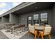 Comfortable rooftop deck with outdoor seating, dining area, and stylish decor at 904 Veterans Way, Carmel, IN 46032