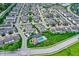 An aerial view of a neighborhood with a community pool at 9713 Springcress Dr, Noblesville, IN 46060