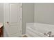 Well-lit bathroom featuring a deep soaking tub at 9713 Springcress Dr, Noblesville, IN 46060