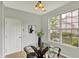 Inviting dining area featuring natural light and contemporary accents at 9713 Springcress Dr, Noblesville, IN 46060