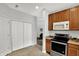 Kitchen features stainless steel appliances, including range and microwave, and neutral countertops at 9713 Springcress Dr, Noblesville, IN 46060
