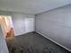 Carpeted bedroom with closet and neutral walls, freshly painted at 10063 Penrith Dr, Indianapolis, IN 46229