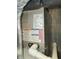 Close-up view of a new HVAC furnace with readily-accessible controls and safety warnings at 10063 Penrith Dr, Indianapolis, IN 46229