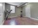 Basement gym featuring a treadmill and elliptical machine, illuminated by natural light from the window at 1014 Massey Ct, Greenwood, IN 46143
