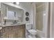 Elegant bathroom featuring a decorative mirror and a combined tub and shower at 1014 Massey Ct, Greenwood, IN 46143