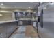 Modern kitchen boasts stainless appliances, island seating, and ample countertop space at 1014 Massey Ct, Greenwood, IN 46143