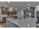 Gourmet kitchen with granite countertops, stainless steel appliances, and custom cabinetry at 1014 Massey Ct, Greenwood, IN 46143