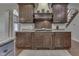 Custom kitchen cabinets with granite countertops and modern appliances enhance the cooking experience at 1014 Massey Ct, Greenwood, IN 46143