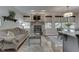 Cozy living room features a stone fireplace, wood floors and large windows at 1014 Massey Ct, Greenwood, IN 46143