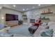 Cozy living room features a stone fireplace, comfortable seating, and a mounted television at 1014 Massey Ct, Greenwood, IN 46143