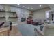 This living room has a stone fireplace, unique decor and comfortable seating arrangement at 1014 Massey Ct, Greenwood, IN 46143