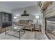 Comfortable living room with stone fireplace and built-in shelving at 1014 Massey Ct, Greenwood, IN 46143