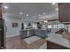 Open concept living room features a stone fireplace and a breakfast nook at 1014 Massey Ct, Greenwood, IN 46143