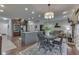 Open-concept features living room with breakfast nook and stone fireplace at 1014 Massey Ct, Greenwood, IN 46143