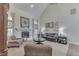 Bright living room features a vaulted ceiling, fireplace, and comfortable seating at 1014 Massey Ct, Greenwood, IN 46143