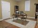 Functional home office with a desk, chair, and natural light from the window at 1014 Massey Ct, Greenwood, IN 46143