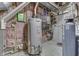 Basement utility room featuring a modern water heater and water softener system at 1014 Massey Ct, Greenwood, IN 46143
