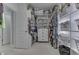 Walk-in closet featuring custom shelving, ample storage space, and easy access to belongings at 1014 Massey Ct, Greenwood, IN 46143