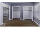 Empty bedroom with hardwood floors, neutral walls, closet space, and natural light at 1049 N Tremont N St, Indianapolis, IN 46222