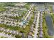 See this neighborhood from above, complete with neatly arranged houses and peaceful ponds at 10625 Gathering Dr, Indianapolis, IN 46259