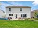 Enjoy outdoor living with this backyard featuring a patio, furniture, and lush green grass at 10625 Gathering Dr, Indianapolis, IN 46259