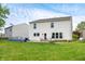A serene backyard features a patio area perfect for relaxation and outdoor entertaining at 10625 Gathering Dr, Indianapolis, IN 46259
