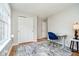 Bright bedroom with hardwood floors, modern rug, and closet at 11108 Oakridge Dr, Fishers, IN 46038