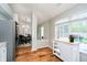 Open-concept kitchen with stainless steel appliances, flows into dining area at 11108 Oakridge Dr, Fishers, IN 46038