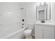 A bathroom has a bathtub, shower, toilet, and vanity with sink at 1116 Heatherwood Dr, Indianapolis, IN 46241