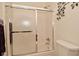 Bathroom features a shower-tub combo with a sliding door at 11541 Coastal Dr, Indianapolis, IN 46229