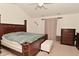 Spacious bedroom with wood furnishings and a light, neutral color palette, creating a relaxing atmosphere at 11541 Coastal Dr, Indianapolis, IN 46229