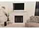 Close-up of a decorative fireplace with tiled surround, perfect for cozy evenings at 11541 Coastal Dr, Indianapolis, IN 46229