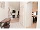 Open hallway leading to a cozy living room with a fireplace and comfortable seating at 11541 Coastal Dr, Indianapolis, IN 46229