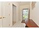 Inviting entryway featuring tile flooring and an ornate glass storm door at 11541 Coastal Dr, Indianapolis, IN 46229