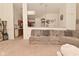 Bright living space featuring plush neutral carpeting and open access to the kitchen at 11541 Coastal Dr, Indianapolis, IN 46229