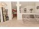 View of the living room showcases a split layout with a partial wall dividing spaces at 11541 Coastal Dr, Indianapolis, IN 46229