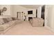 Comfortable living room featuring a fireplace and ample seating for relaxation at 11541 Coastal Dr, Indianapolis, IN 46229