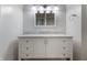 Bathroom featuring a large white vanity with a marble countertop and great lighting at 1171 S Daisy Ln, New Palestine, IN 46163