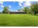 Charming single-story brick home with a spacious lawn and inviting curb appeal at 1171 S Daisy Ln, New Palestine, IN 46163