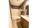 Well-maintained bathroom features modern fixtures and wood-look vinyl flooring at 11821 Bills Ave, Fishers, IN 46037